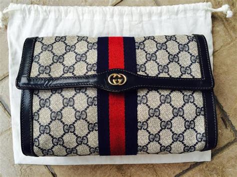 vintage gucci gg clutch|authentic vintage Gucci handbags.